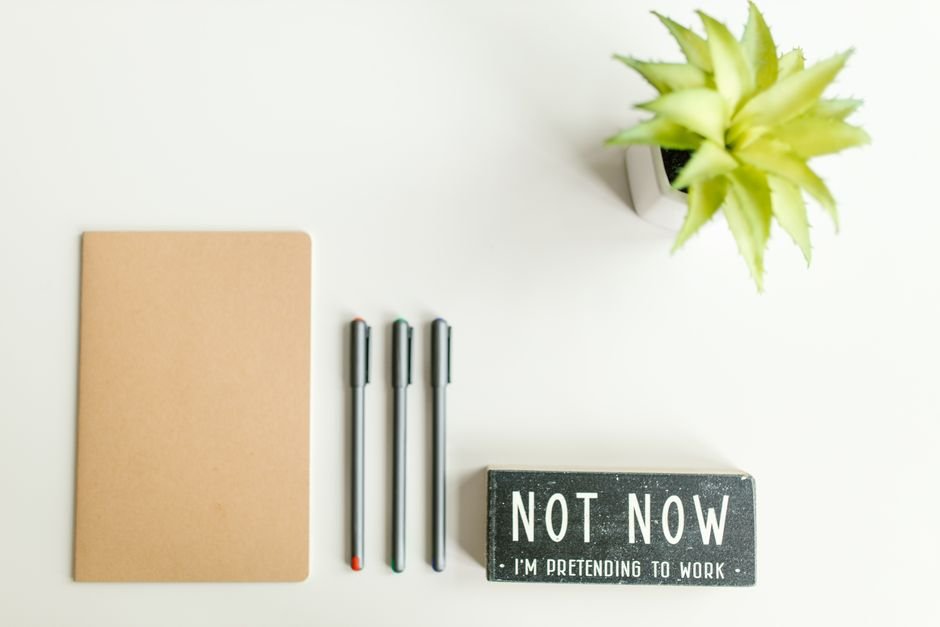 Notebook and pen on a bright desk